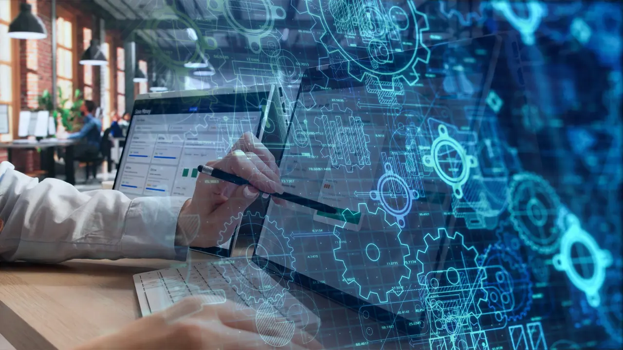 A person using a stylus on a dual-screen laptop overlaid with digital gear and clockwork graphics representing credit intelligence infrastructure